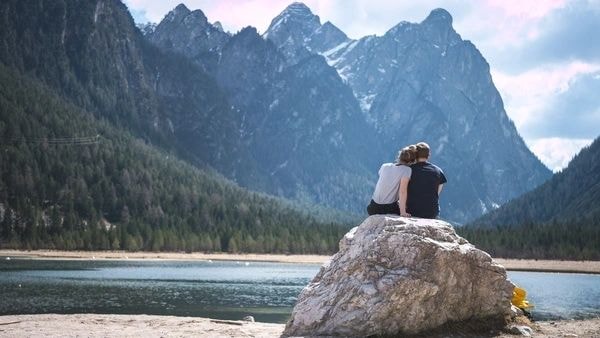 Couple on mountain lake